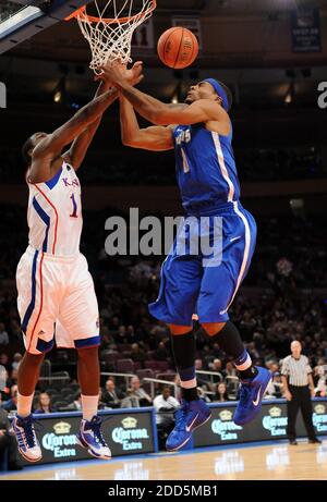 Kansas guard Elijah Johnson (15) covers Radford guard Amir Johnson (11 ...