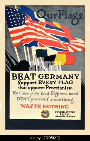 Vintage WW1 Propaganda WAR POSTER ‘OUR FLAGS’ WWI USA HOME FRONT BEAT GERMANY WASTE NOTHING Vintage Posters  Original antique World War One home front propaganda poster - ‘Our Flags Beat Germany Support Every Flag that opposes Prussianism’ Eat less of the food Fighters need Deny yourself something Waste Nothing - featuring artwork by the American illustrator and poster artist Adolph Treidler (1886-1981) depicting the stars and stripes flag of the United States of America and the Union Jack flag of the United Kingdom with the flags of the other allied countries flying in a colourful row Stock Photo