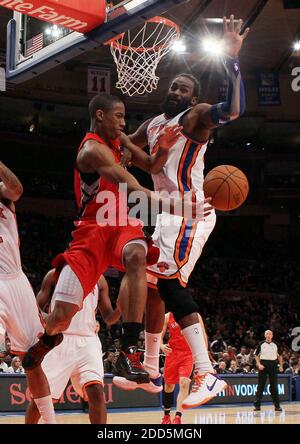 NO FILM, NO VIDEO, NO TV, NO DOCUMENTARY - Ronny Turiaf, right, of the New York Knicks defends a drive by DeMar DeRozan of the Toronto Raptors during the NBA Basketball match, New York Knicks vs Toronto Raptors at Madison Square Garden in New York City, NY, USA on December 8, 2010. The Knicks defeated the Raptors, 113-110. Photo by Jim McIsaac/Newsday/MCTABACAPRESS.COM Stock Photo