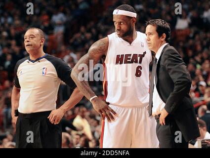 NO FILM, NO VIDEO, NO TV, NO DOCUMENTARY - Miami Heat's LeBron James talks with head coach Erik Spoelstra during NBA action against the NNew Orleans Hornets during the NBA Basketball match, Miami Heat vs New Orleans Hornets at the American Airlines Arena in Miami, FL, USA on December 13, 2010. Photo by Robert Duyos/Sun Sentinel/MCT/ABACAPRESS.COM Stock Photo