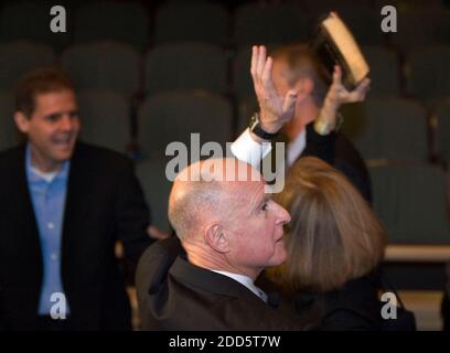 NO FILM, NO VIDEO, NO TV, NO DOCUMENTARY - Gov. Jerry Brown, with his wife, Anne Gust Brown, right, waves to a cheering crowd after he was sworn in as California's 39th governor during his inauguration at Memorial Auditorium, Monday, January 3, 2011, in Sacramento, California. Photo by Randy Pench/Sacramento Bee/MCT/ABACAPRESS.COM Stock Photo