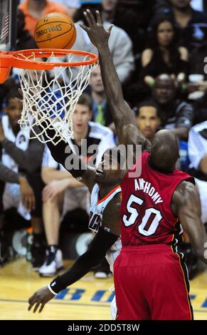 NO FILM, NO VIDEO, NO TV, NO DOCUMENTARY - Charlotte Bobcats Stephen Jackson (1) slices his way to the basket for a layup against Miami Heat center Joel Anthony (50) during the NBA Basketball Miami Heat vs Charlotte Bobcats at the Time Warner Cable Arena in Charlotte, NC on January 3, 2011. Photo by Jeff Siner/Charlotte Observer/MCT/ABACAPRESS.COM Stock Photo