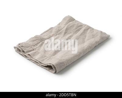 Side view on folded gray linen napkin isolated on white background. light gray linen napkin. Isolated on white with clipping path. Stock Photo