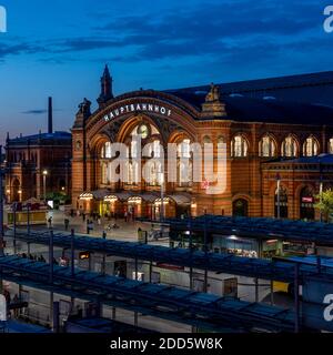 Bremen's Central Station (Hauptbahnhof) dates back to 1891. The transport hub also includes the main tram station too. Shot during the day and evening Stock Photo