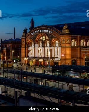 Bremen's Central Station (Hauptbahnhof) dates back to 1891. The transport hub also includes the main tram station too. Shot during the day and evening Stock Photo