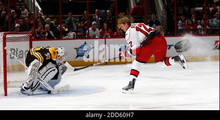 NO FILM, NO VIDEO, NO TV, NO DOCUMENTARY - The Carolina Hurricanes' Eric Staal puts a shot past goalie Tim Thomas, of the Boston Bruins, in the Elimination Shootout competition during the Skills Competition of the NHL All-Star Game at the RBC Center in Raleigh, North Carolina, USA on January 29, 2011. Photo by Chris Seward/Raleigh News & Observer/MCT/ABACAPRESS.COM Stock Photo