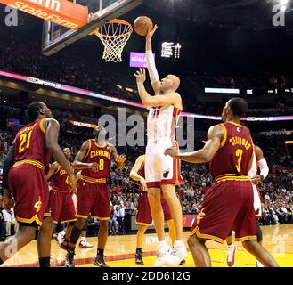 NO FILM, NO VIDEO, NO TV, NO DOCUMENTARY - Miami Heat's Zydrunas Ilgauskas puts up a shot against the Cleveland Cavaliers in the first quarter during the NBA Basketball match, Cleveland Cavaliers vs Miami Heat at AmericanAirlines Arena in Miami, FL, USA on January 31, 2011. The Heat won, 117-90. Photo by Hector Gabino/El Nuevo Herald/MCT/ABACAPRESS.COM Stock Photo