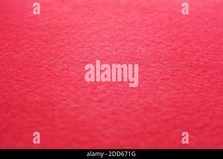 Angle view of Red felt texture for background. Selective soft focus, shallow depth of field. Stock Photo