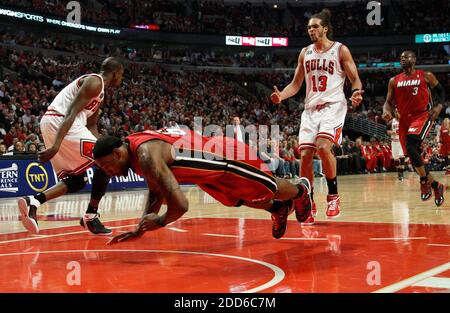 NO FILM, NO VIDEO, NO TV, NO DOCUMENTARY - Chicago Bulls' Joakim Noah (13) reacts after a foul was called on teammate Luol Deng, left, as the Miami Heat's LeBron James goes to the floor during the first half in Game 5 of the NNBA Basketball Eastern Conference finals match, Miami Heat Vs Chicago Bulls at the United Center in Chicago, IL, USA on May 26, 2011. Photo by Nuccio DiNuzzo/Chicago Tribune/MCT/ABACAPRESS.COM Stock Photo