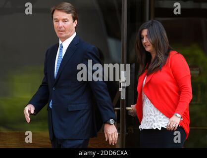 NO FILM, NO VIDEO, NO TV, NO DOCUMENTARY - Former U.S. Senator and former Democratic presidential candidate John Edwards and his daughter, Cate, leave the federal building in Winston-Salem, NC, USA,, after his indictment on charges of illegal use of campaign funds on Friday, June 3, 2011. Photo by Chuck Liddy/Raleigh News & Observer/MCT/ABACAPRESS.COM Stock Photo