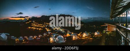 Aerial view of camping grounds and tents on Doi Mon Cham mountain in Mae Rim, Chiang Mai province, Thailand Stock Photo