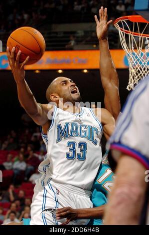 NO FILM, NO VIDEO, NO TV, NO DOCUMENTARY - Orlando Magic guard Grant Hill scores past New Orleans/Oklahoma City Hornets forward Hilton Armstrong at Amway Arena in Orlando, Florida, Wednesday, December 20, 2006, FL, USA on December 20, 2006. Photo by Stephen M. Dowell/Orlando Sentinel/MCT/Cameleon/ABACAPRESS.COM Stock Photo