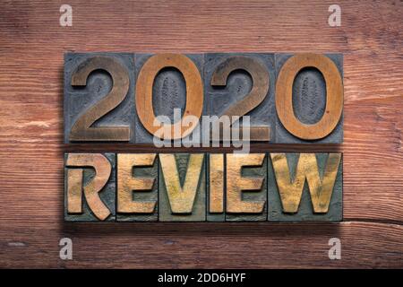 review 2020 combined from vintage letterpress on  varnished wooden surface Stock Photo