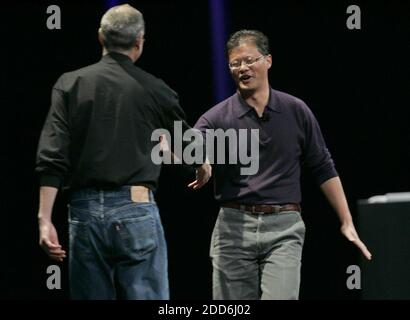 NO FILM, NO VIDEO, NO TV, NO DOCUMENTARY - Steve Jobs, CEO of Apple, Inc., left, greets Jerry Yang, co-founder of Yahoo, during his keynote speech to open Macworld, Tuesday, January 9, 2007, at the Moscone Center in San Francisco. Photo by Gary Reyes/San Jose Mercury News/MCT/ABACAPRESS.COM Stock Photo