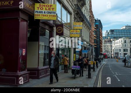 London, UK.  24 November 2020. To let signs on Ludgate Hill near the City of London.  As the coronavirus pandemic continues, the majority of financial workers continue to work from home and many offices, including company headquarters, remain virtually empty. Credit: Stephen Chung / Alamy Live News Stock Photo