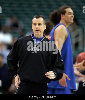 Florida coach Billy Donovan talks to his team during their men's ...