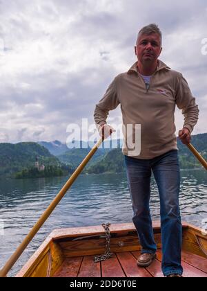Pletna boat ride, Lake Bled, Gorenjska, Slovenia, Europe Stock Photo