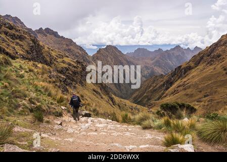 Hiking down from Dead Womans Pass 5,200m summit, Inca Trail Trek day 2, Cusco Region, Peru, South America Stock Photo