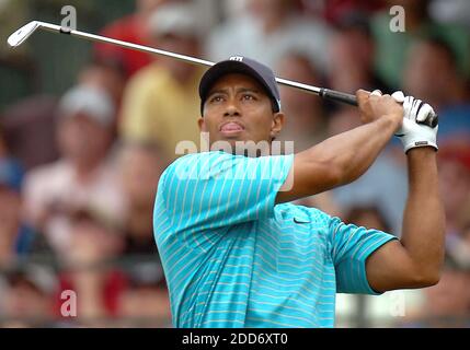 NO FILM, NO VIDEO, NO TV, NO DOCUMENTARY - USA's Tiger Woods bites down on his tongue as he watches his drive from the 17th tee box during first round play in the Wachovia Championship at Quail Hollow Club in Charlotte, NC, USA on May 3, 2007. Photo by Davie Hinshaw/Charlotte Observer/MCT/Cameleon/ABACAPRESS.COM Stock Photo