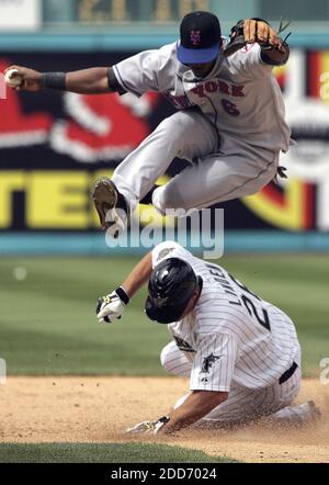 NO FILM, NO VIDEO, NO TV, NO DOCUMENTARY - New York Mets second baseman Ruben Gotay leaps over the Florida Marlins' Todd Linden to complete a double play. The Mets defeated the Marlins, 6-4, at Dolphin Stadium in Miami, FL, USA on May 27, 2007. Photo by Carl Juste/Miami Herald/MCT/Cameleon/ABACAPRESS.COM Stock Photo