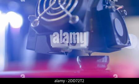 Three dimensional printing machine prints physical 3D model - close up Stock Photo