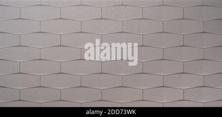 Panorama of Modern white stone tile wall pattern and seamless background Stock Photo