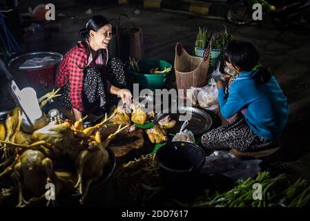 Vendor selling chickens in Hpa An Morning Market, Kayin State (Karen State), Myanmar (Burma) Stock Photo