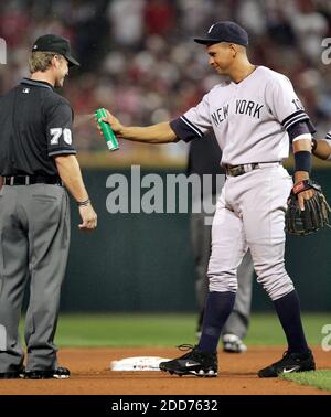 NO FILM, NO VIDEO, NO TV, NO DOCUMENTARY - New York Yankees Alex Rodriguez sprays left field umpire Jim Wolf with bug spray in the eighth inning during Game 2 of an American League Division Series at Jacobs Field in Cleveland, OH, USA on October 5, 2007. Photo by Phil Masturzo Jr /Akron Beacon Journal/MCT/Cameleon/ABACAPRESS.COM Stock Photo