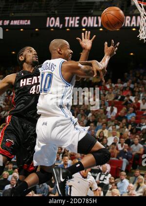 NO FILM, NO VIDEO, NO TV, NO DOCUMENTARY - Orlando Magic guard Keith Bogans, right, is fouled by Miami Heat forward Udonis Haslem (40) at Amway Arena in Orlando, FL, USA on November 24, 2007. Orlando Magic won 120-99. Photo by Stephen M. Dowell/Orlando Sentinel/MCT/Cameleon/ABACAPRESS.COM Stock Photo