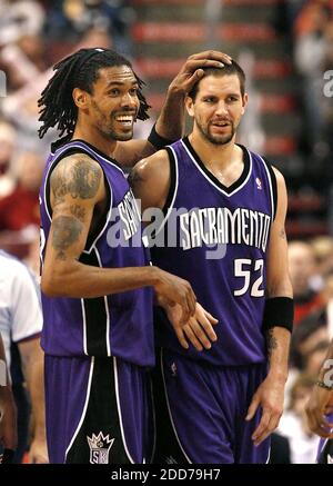 March 7, 2011; Sacramento, CA, USA; Houston Rockets center Brad Miller (52)  dribbles in the lane against the Sacramento Kings during the second quarter  at the Power Balance Pavilion Stock Photo - Alamy