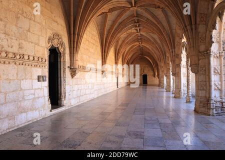 Archway of an old monastery. Cloisters of Jeronimos Monastery Stock Photo