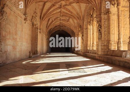 Archway of an old monastery. Cloisters of Jeronimos Monastery Stock Photo