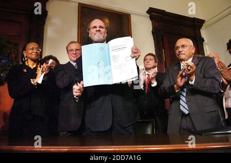 NO FILM, NO VIDEO, NO TV, NO DOCUMENTARY - New Jersey Gov. Jon Corzine, flanked by lawmakers, holds up the signed legislation to abolish the death penalty in the state of New Jersey, in Trenton, NJ, USA Monday, on December 17, 2007. Photo by Sarah J. Glover/Philadelphia Inquirer/MCT/ABACAPRESS.COM Stock Photo