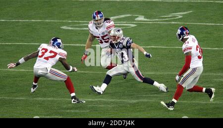 NO FILM, NO VIDEO, NO TV, NO DOCUMENTARY - The New England Patriots' Wes Welker (83) runs for a first down against the New York Giants in the third qurter of Super Bowl XLII at University of Phoenix Stadium in Glendale, AZ, USA on February 3, 2008. The NY Giants won 17-14. Photo by Terry Gilliam/MCT/Cameleon/ABACAPRESS.COM Stock Photo
