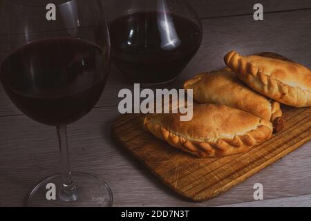 Argentinian delicious empanadas and wine Stock Photo