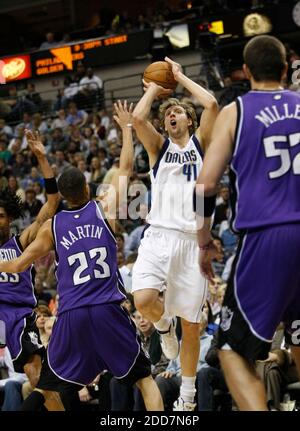 March 7, 2011; Sacramento, CA, USA; Houston Rockets center Brad Miller (52)  dribbles in the lane against the Sacramento Kings during the second quarter  at the Power Balance Pavilion Stock Photo - Alamy