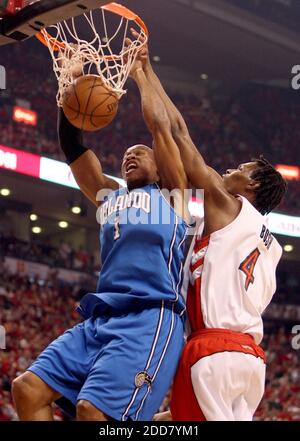 NO FILM, NO VIDEO, NO TV, NO DOCUMENTARY - Orlando Magic's Maurice Evans dunks over Toronto Raptors' Chris Bosh at Air Canada Centre in Toronto, Canada on April 26, 2008, during round one in Game 4 of the NBA Eastern Conference playoffs. The Magic defeated the Raptors 106-94. Photo by Gary W. Green/Orlando Sentinel/MCT/Cameleon/ABACAPRESS.COM Stock Photo