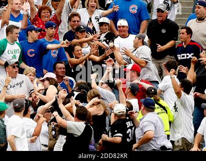 Chicago White Sox's Juan Uribe walks off the field during the fourth inning  against the Texas Rangers in Chicago on July 23, 2008. The White Sox won  10-8. (UPI Photo/Brian Kersey Stock