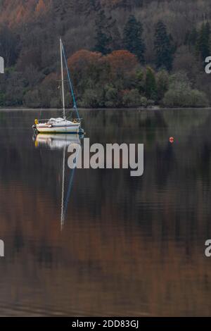 Sailing boat on Loch Tay in autumn, Kenmore, Perthshire, Highlands of Scotland, United Kingdom, Europe Stock Photo