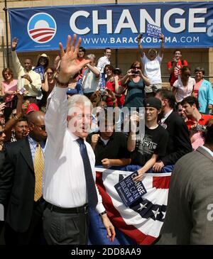 President Bill Clinton waves to his supporters during a campaign stop ...