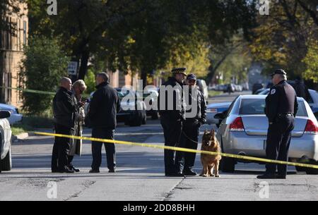 NO FILM, NO VIDEO, NO TV, NO DOCUMENTARY - Police investigate the scene where a child's body was found in a 1994 white Chevrolet Suburban, in Chicago, Illinois, USA on Monday, October 27, 2008. Authorities didn't identify the body of a young black boy found in the SUV, but police Cmdr. Wayne Gulliford said the license plate on the SUV found matched the one sought in an Amber Alert issued after singer Jennifer Hudson's mother and brother were found shot to death at home on Friday. Photo by Michael Tercha/Chicago Tribune/MCT/ABACAPRESS.COM Stock Photo