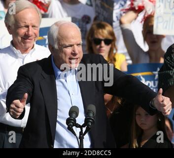 NO FILM, NO VIDEO, NO TV, NO DOCUMENTARY - Republican presidential candidate Senator John McCain speaks to supporters during a campaign rally outside Raymond James Stadium in Tampa, Florida, Monday, on November 3, 2008. Sen. Joe Lieberman (I-Conn.) looks on at left. Photo by Gary W. Green/Orlando Sentinel/MCT/ABACAPRESS.COM Stock Photo