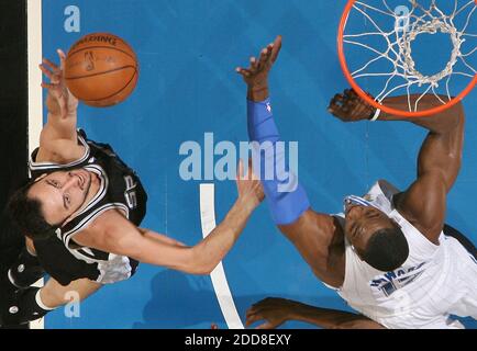 NO FILM, NO VIDEO, NO TV, NO DOCUMENTARY - Orlando Magic center Dwight Howard, right, reaches up to block the shot of San Antonio Spurs guard Manu Ginobili, left, at Amway Arena in San Antonio, TX, USA on December 18, 2008. Photo by Stephen M. Dowell/Orlando Sentinel/MCT/Cameleon/ABACAPRESS.COM Stock Photo