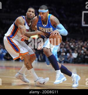 NO FILM, NO VIDEO, NO TV, NO DOCUMENTARY - Denver Nuggets forward Carmelo Anthony (15) drives past New York Knicks forward Wilson Chandler (21) before pulling up for a jump shot in the fourth quarter at Madison Square Garden in New York City, NY, USA on December 28, 2008. Denver Nuggets won 117-110. Photo by J. Conrad Williams Jr./Newsday/MCT/Cameleon/ABACAPRESS.COM Stock Photo