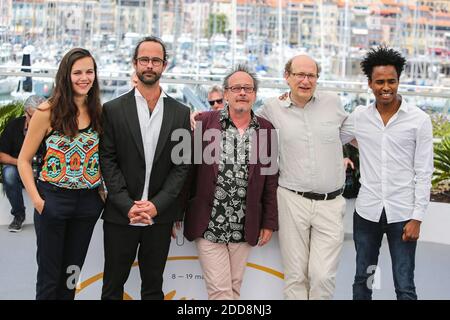 Marion Gachet, Cedric Herrou, director Michel Toesca, producer Jean-Marie Gigon and Aboubakar Ali attend the 'Libre' Photocall during the 71st annual Cannes Film Festival at Palais des Festivals on May 18, 2018 in Cannes, France. Photo by David Boyer/ABACAPRESS.COM Stock Photo