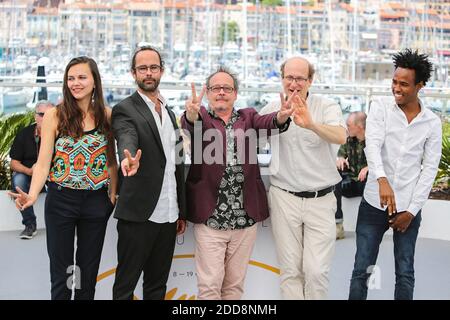 Marion Gachet, Cedric Herrou, director Michel Toesca, producer Jean-Marie Gigon and Aboubakar Ali attend the 'Libre' Photocall during the 71st annual Cannes Film Festival at Palais des Festivals on May 18, 2018 in Cannes, France. Photo by David Boyer/ABACAPRESS.COM Stock Photo