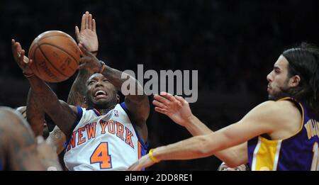 NO FILM, NO VIDEO, NO TV, NO DOCUMENTARY - New York Knicks guard Nate Robinson (4) runs into heavy defense from Los Angeles Lakers forward Josh Powell (21), guard Jordan Farmar (5) and guard Sasha Vujacic (18) in the second quarter at Madison Square Garden in New York City, NY, USA on February 2, 2009. Photo by J. Conrad Williams Jr./Newsday/MCT/Cameleon/ABACAPRESS.COM Stock Photo