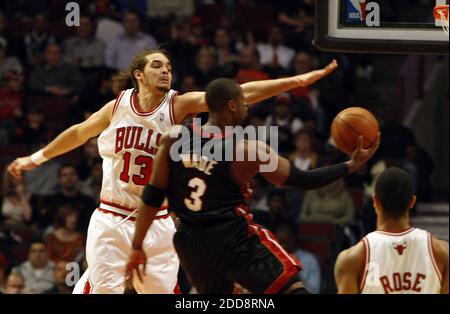 NO FILM, NO VIDEO, NO TV, NO DOCUMENTARY - Chicago Bulls' Joakim Noah can't stop Miami Heat's Dwyane Wade from scoring during NBA action at the United Center in Chicago, Illinois, on Thursday, February 12, 2009. Miami Heat won 95-93. Photo by Scott Strazzante/Chicago Tribune/MCT/Cameleon/ABACAPRESS.COM Stock Photo