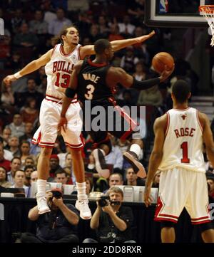 NO FILM, NO VIDEO, NO TV, NO DOCUMENTARY - Chicago Bulls' Joakim Noah can't stop Miami Heat's Dwyane Wade from scoring during NBA action at the United Center in Chicago, Illinois, on Thursday, February 12, 2009. Miami Heat won 95-93. Photo by Scott Strazzante/Chicago Tribune/MCT/Cameleon/ABACAPRESS.COM Stock Photo