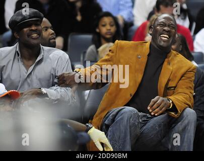 Former NBA basketball players David Robinson, Michael Jordan, John Stockton  and Rutgers women's coach C. Vivian Stringer, left to right, are honored at  halftime of the NCAA Final Four championship basketball game